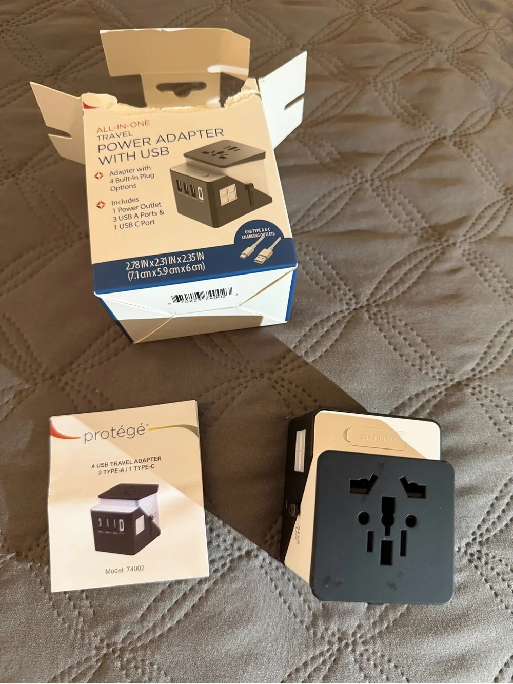 Protegé Black All‑in‑One Travel Power Adapter with USB-A and USB-C